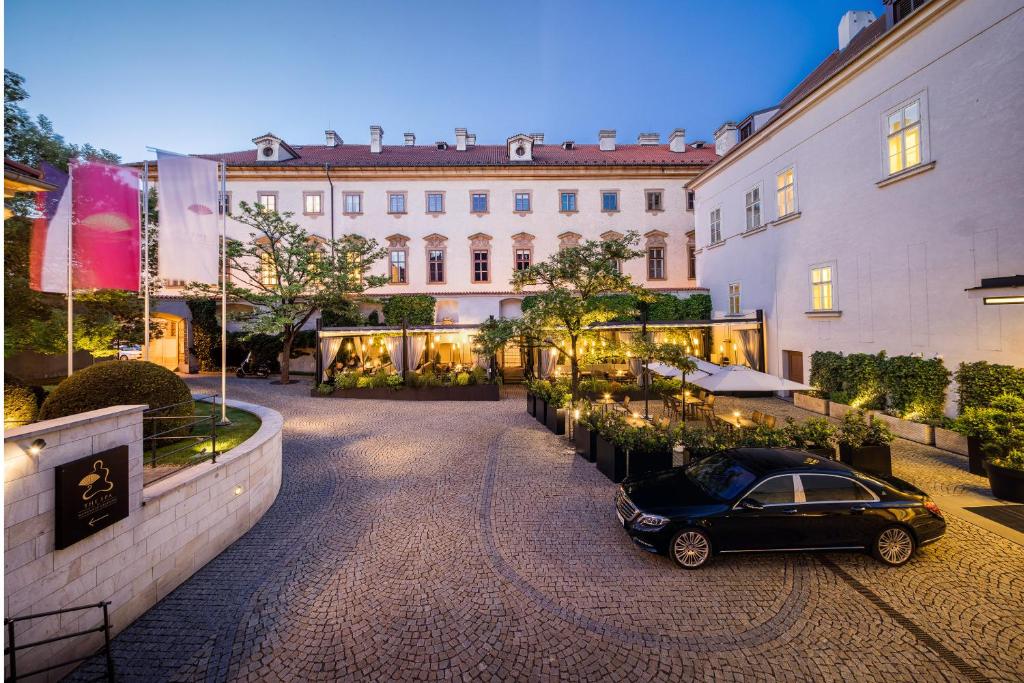 Mandarin Oriental Prague luxury hotel courtyard and historic architecture in the heart of Prague