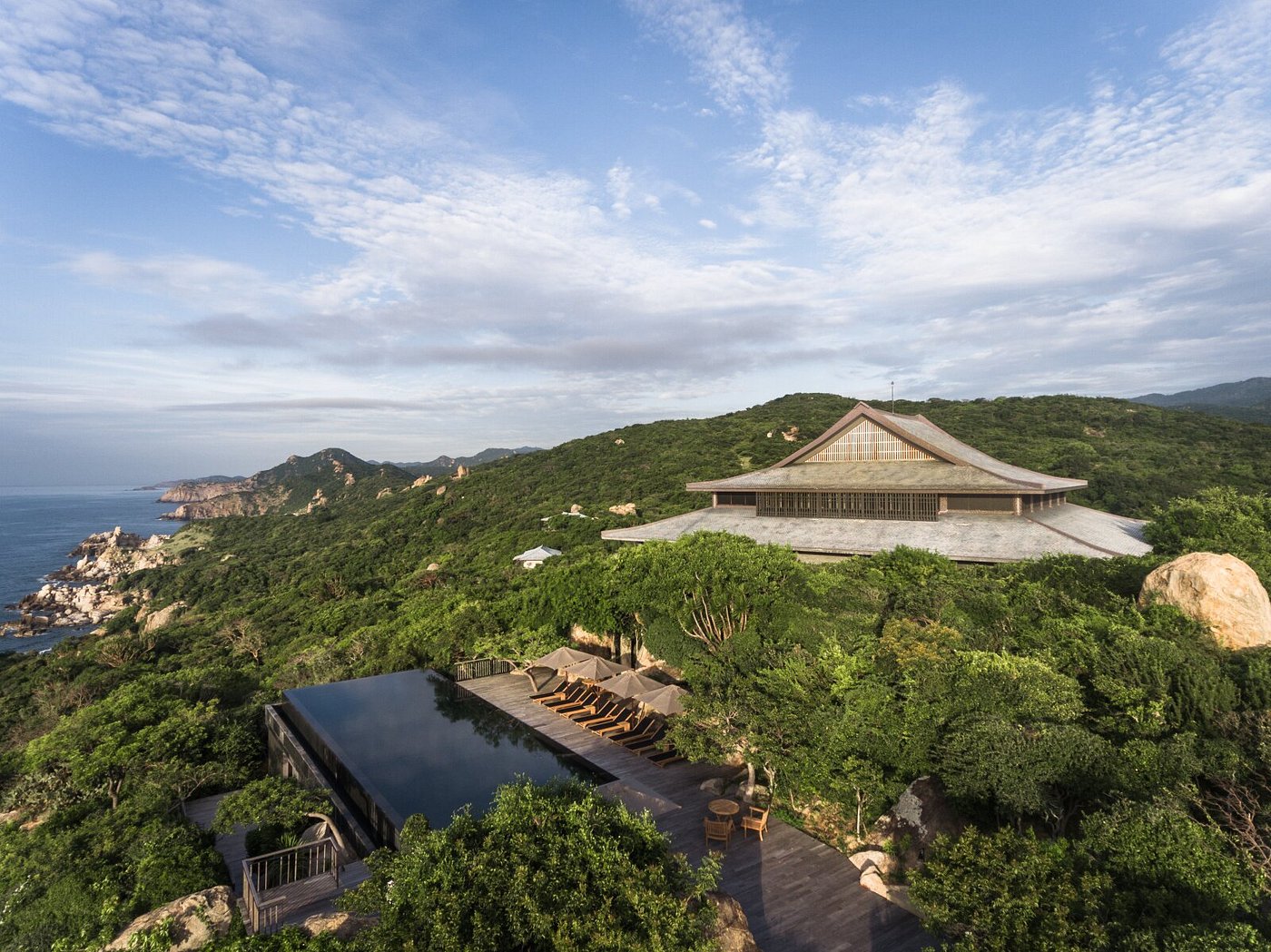 Amanoi resort nestled along Vietnam’s Nui Chua National Park coastline with infinity pool overlooking the sea